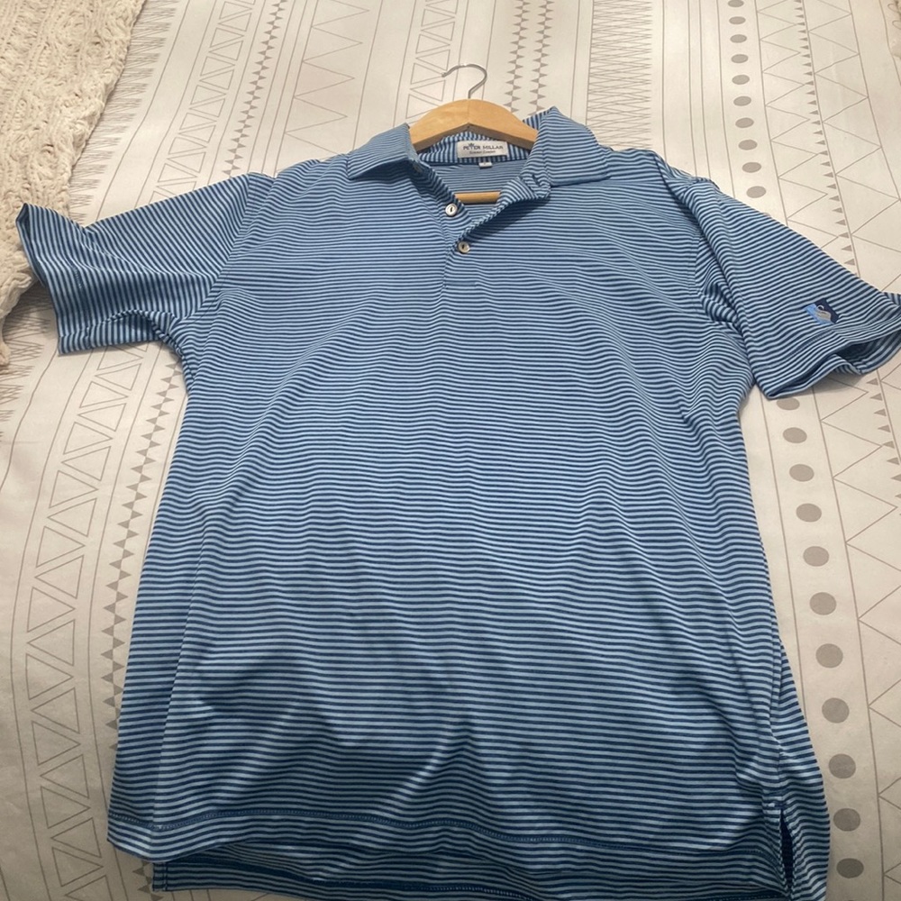 Peter Millar golf shirt with swan embroidered on sleeve
